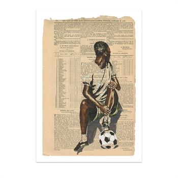 picture of a seated football player with his soccer ball