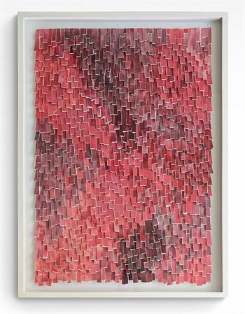 large torn paper collage artwork in shades of red in white frame