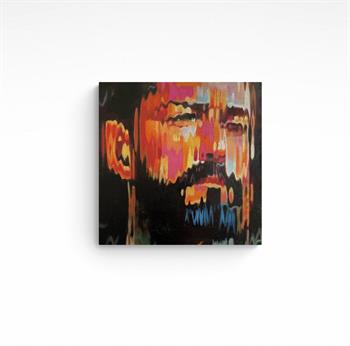 small oil portrait of a bearded man