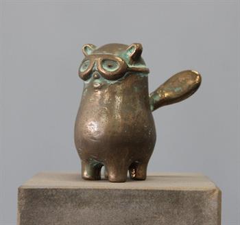 small bronze sculpture of a fantasy creature wearing goggles