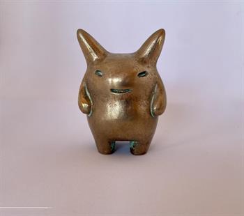 small bronze sculpture of a fierce fantasy creature