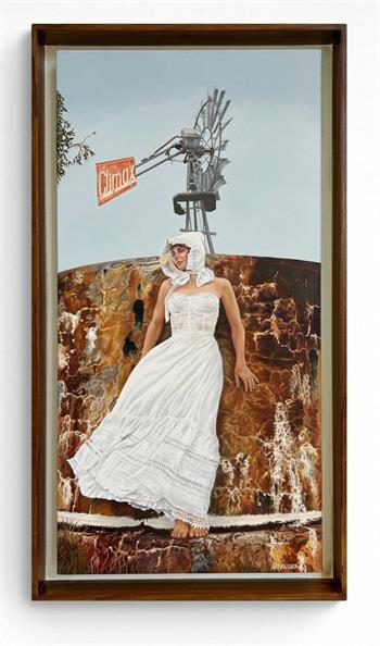 picture of a beautiful young woman wearing a bonnet and petticoat in the Karoo landscape