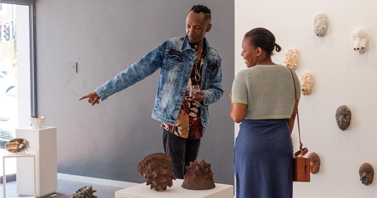 Sylvester Zanoxolo Mqeku at his solo exhibition of sculptures.